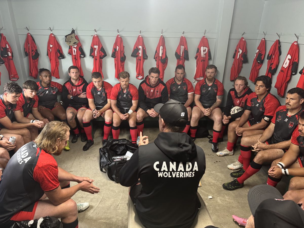 Aaron Zimmerle addresses the Canada Wolverines squad in the changing room after the Scotland Test